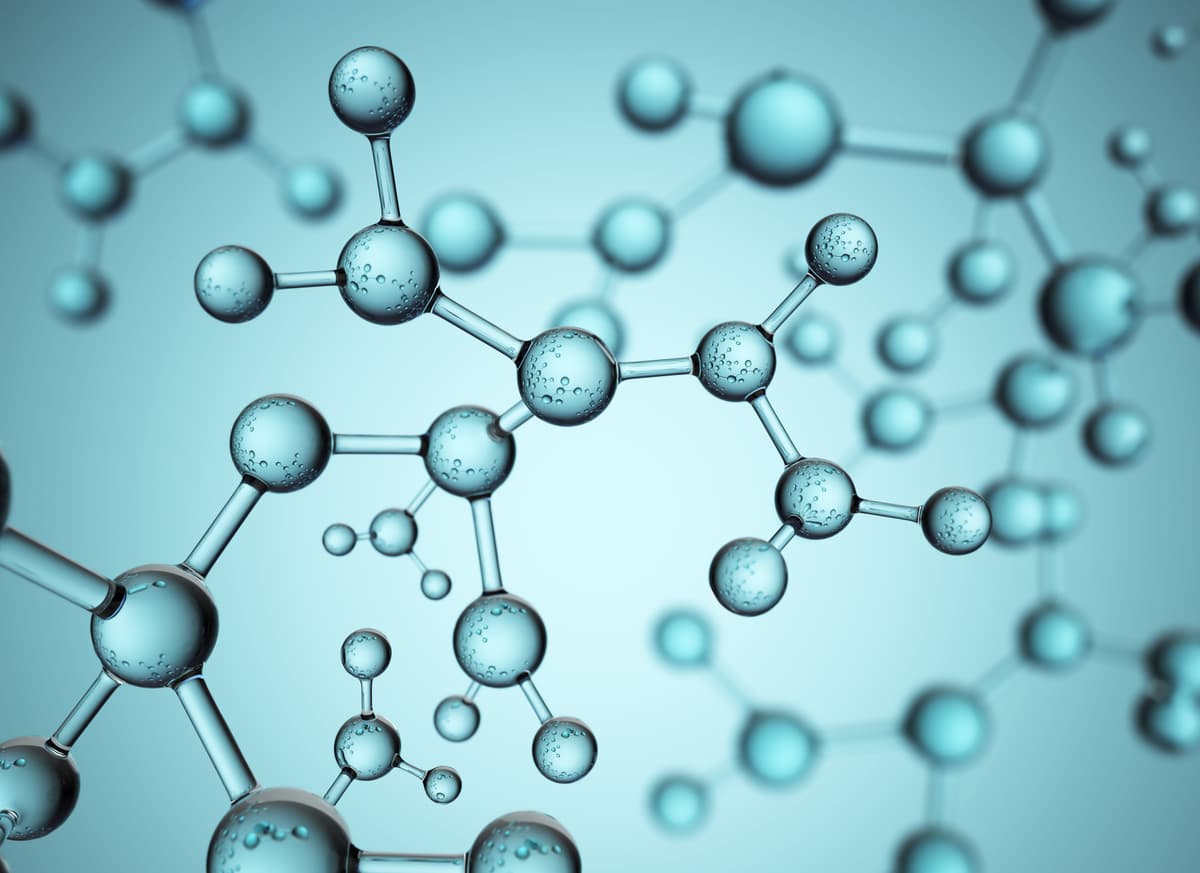 Estructuras moleculares transparentes en un fondo azul, con átomos representados por esferas y conexiones entre ellos.